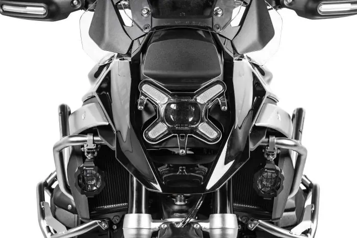 Motorcycle headlight protector top
